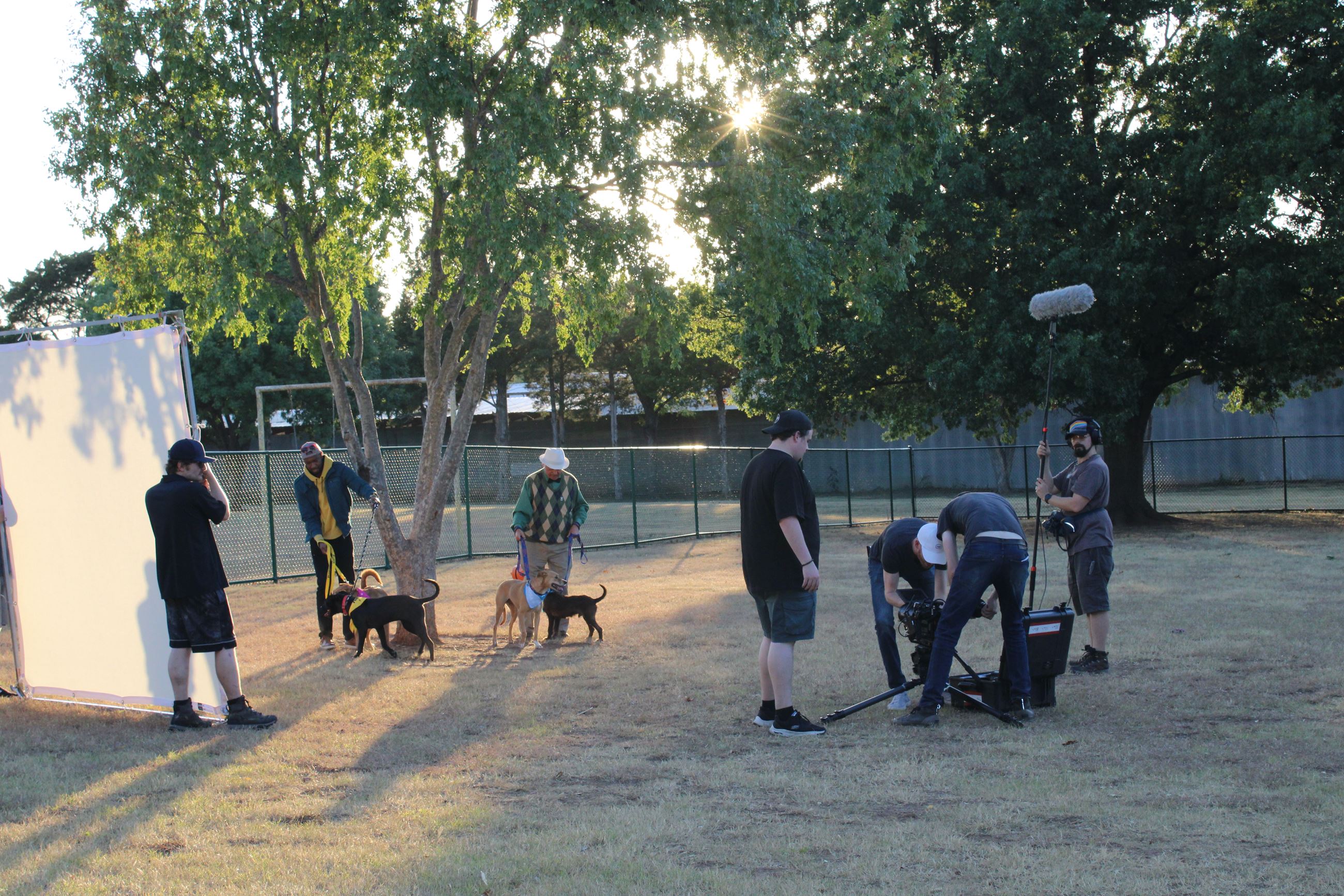 Take Two-actors, pups and crew at dog park